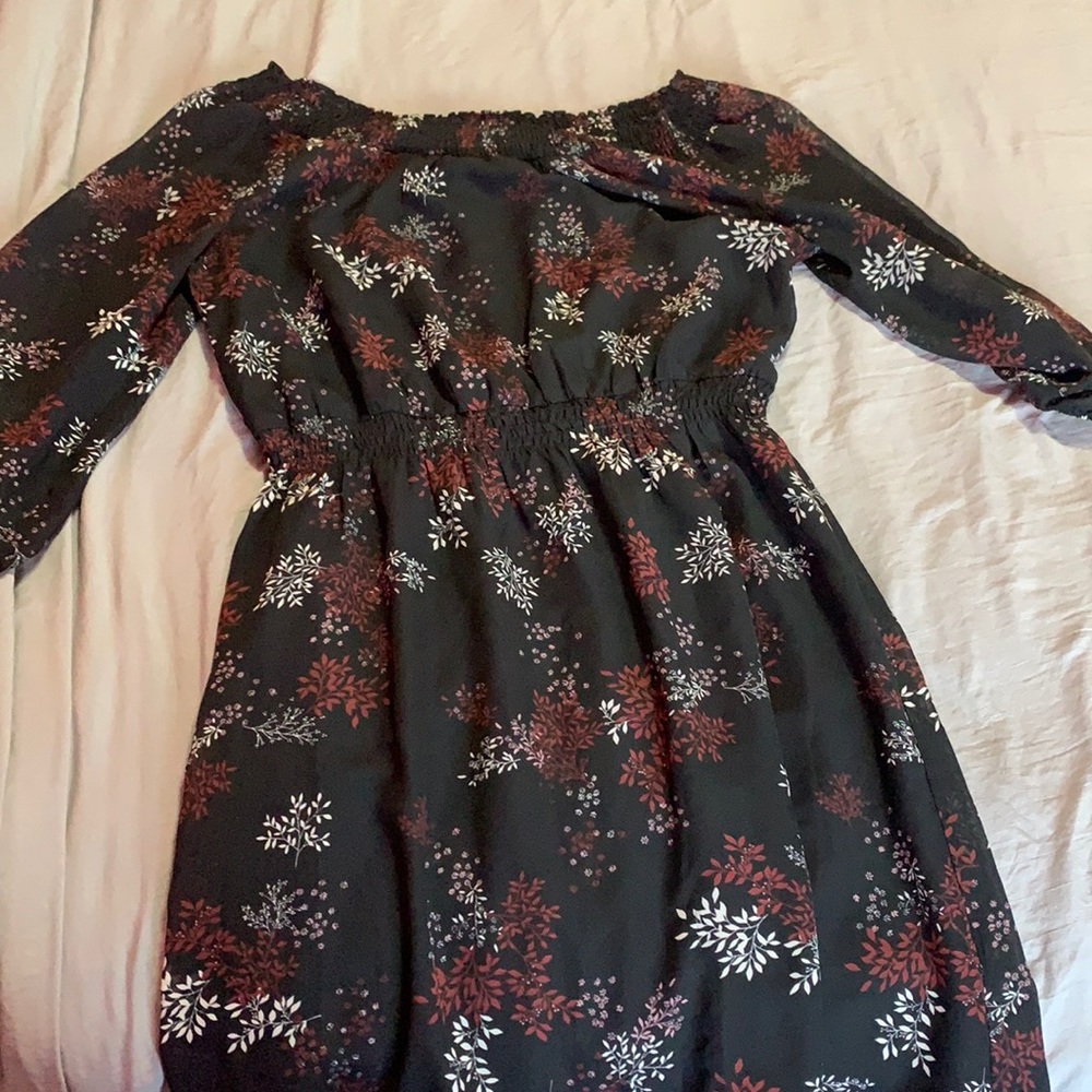 Red, pink, white, flowers on a black dress